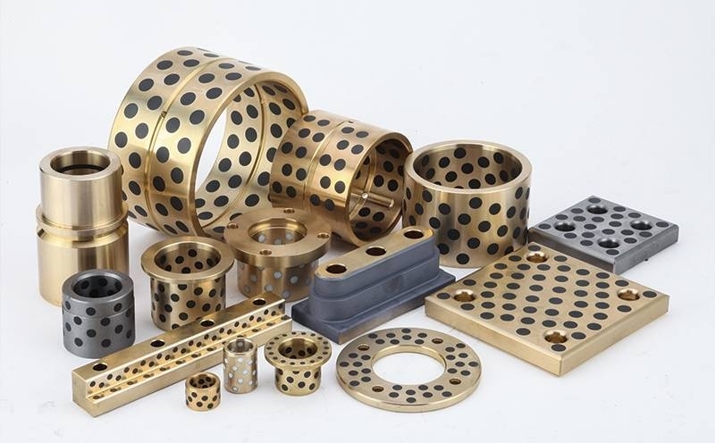 Cén difríocht atá idir bushings cré -umha sintéaraithe agus bushings cré -umha teilgthe?